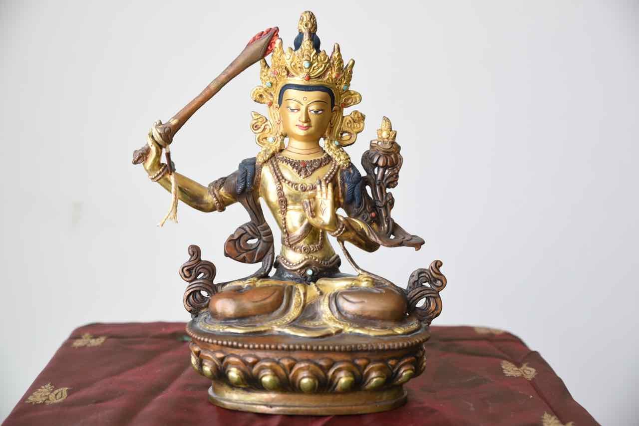 Manjousrhi l'épée flamboyante tranche l'ignorance